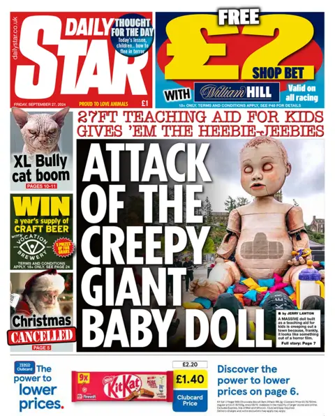 The front page of the Daily Star. The headline reads: 'Attack of the creepy giant baby doll'.