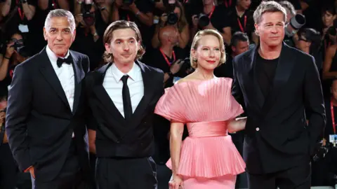 Getty Images Brad Pitt, Amy Ryan, Austin Abrams and George Clooney arrive at the premiere of 'Wolfs' at the 81st annual Venice International Film Festival, in Venice, Italy, 01 September 2024. The movie is presented out of competition at the festival running from 28 August to 07 September 2024