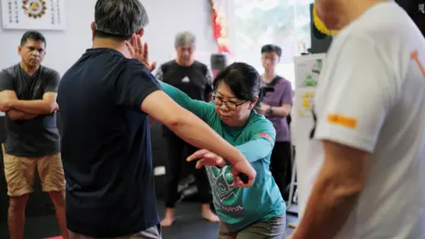 Roman Catholic Archdiocese of Singapore Security and safety volunteers get basic defence training to prepare for Pope Francis' visit to Singapore.