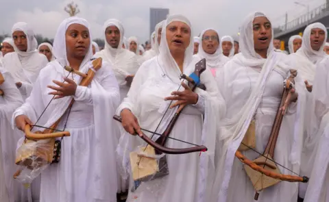 Tiksa Negeri / Reuters Ethiopian Orthodox choir members sing during the Meskel festival