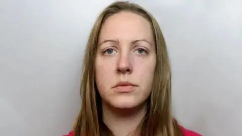 Cheshire Constabulary A mugshot of Lucy Letby wearing a red hoody