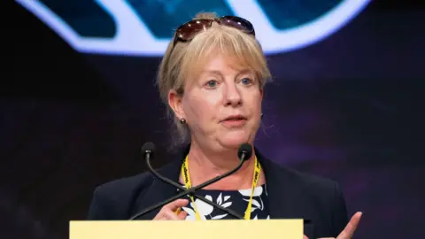 PA Media Shona Robison giving at a speech at the SNP conference in Edinburgh