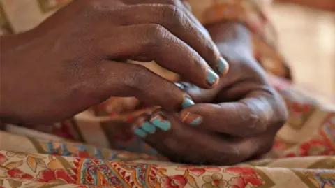 BBC/Mohanad Hashim A woman in Sudan