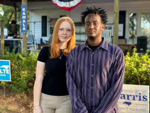 Chloe Hercula (left), chair of the Onslow County Teen Democrats, brought Gavin Rohwedder (right) to the campaign event