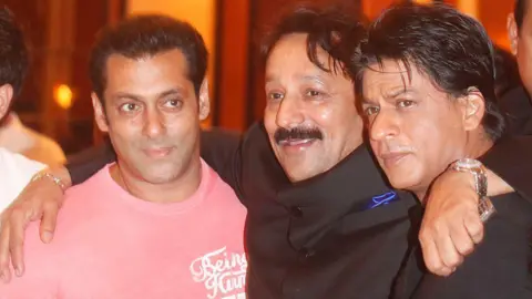 Getty Images Congress MLA Baba Siddique with Bollywood actors Salman Khan and Shah Rukh Khan at his iftaari party at Taj Lands end, Bandra on July 21, 2013 in Mumbai, India. Shah Rukh Khan and Salman Khan had fought way back in 2008 in Katrina Kaif's birthday party at Olive