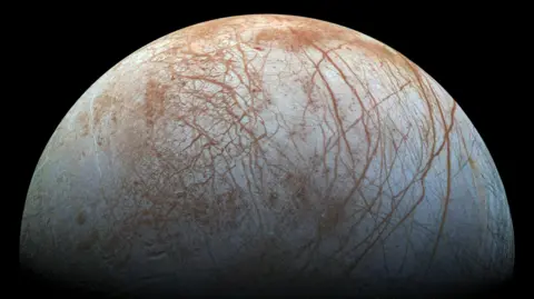 NASA/JPL-Caltech/SETI Institute The puzzling, fascinating surface of Jupiter's icy moon Europa looms large in this newly-reprocessed color view, made from images taken by NASA's Galileo spacecraft in the late 1990s.