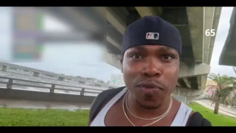 Mike Smalls Jr Screenshot of Mike Smalls Jr as he livestreams during a recent hurricane in Florida