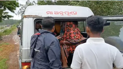 Samarendra Raut and Himansu Samal People being evacuated from low-lying aread in Odisha