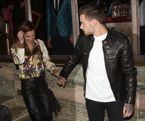 Getty Images Liam Payne and Cheryl Cole at a restaurant in London