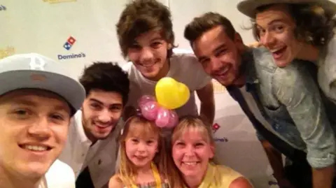 Beth Lewis  Beth Lewis with One Direction and her mother