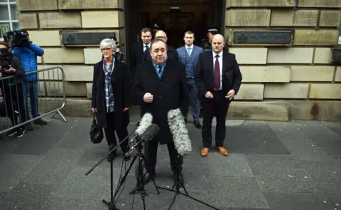 Getty Images Salmond standing outside the High Court in Edinburgh in front of his legal team and supporters.