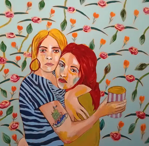 @gethintjones 'Sink or swim' depicts Natalie and her best friend hugging, with both looking at us with serious faces and one of them, with a tattoo on her upper arm holding what appears to be a cup