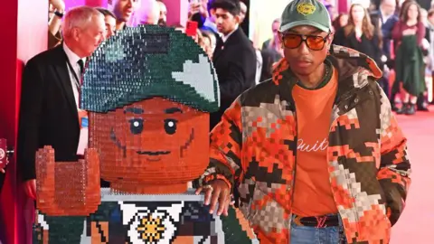 Getty Images Pharrell Williams attends the Closing Night Headline Gala screening of "Piece By Piece" during the 68th BFI London Film Festival at The Royal Festival Hall on October 20, 2024 in London, England