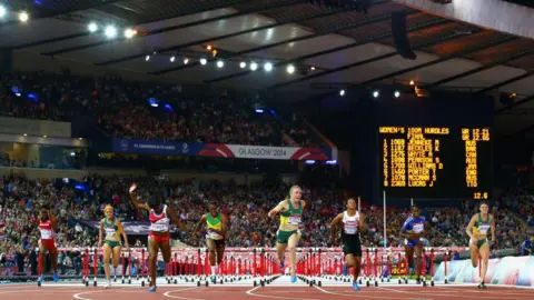 Getty Images eight hurdlers competiting at the 2014 commonwealth games at Hampden stadium