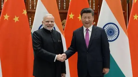 Getty Images Prime Minister Narendra Modi shakes hands with Chinese President Xi Jinping (R) at the West Lake State Guest House in September 2016 in Hangzhou, China during the G20 Leaders Summit 