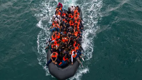 Reuters An overloaded boat in the Channel