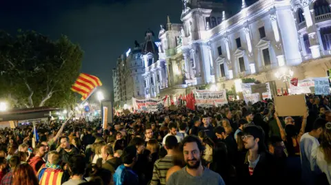 EPA-EFE/REX/Shutterstock Thousands of people take part in a protest to call for the resignation of Valencia's regional government due to the management of the floods in Valencia province, in Valencia, Spain, 09 November 2024.