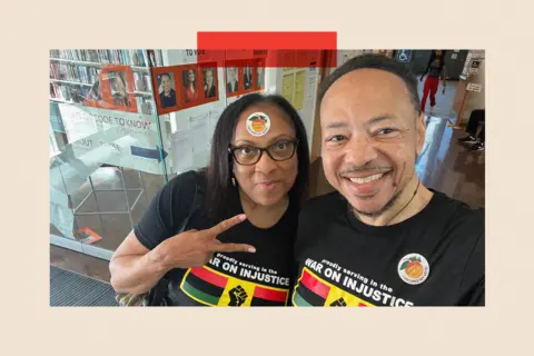 handout Monte Norwood and his wife Wanda after voting in Atlanta