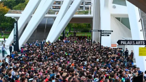 Getty Images Volunteers gather in vast numbers at the City of Arts and Sciences complex in Valencia 