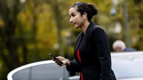 REMKO DE WAAL/EPA-EFE Dutch state secretary for benefits Nora Achahbar arrives at the Catshuis for the weekly council of ministers in the Hague, the Netherlands, 15 November 2024