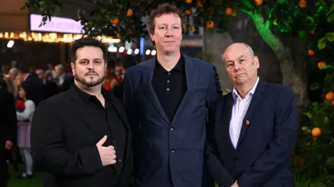 Getty Images From left: James Lamont, Jon Foster and Mark Burton attend the Paddington In Peru premiere