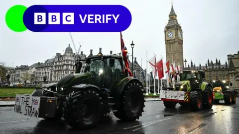 Getty Images A tractor passes Parliament 