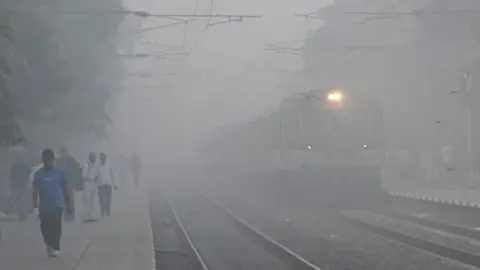 Getty Images Shahabad Mohadpur railway station during heavy smog and foggy morning at Dwarka , on November 16, 2024 in New Delhi, India. (Photo by Vipin Kumar/Hindustan Times via Getty Images)