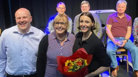 Sheringham Little Theatre Suranne Jones being presented with a bouquet of flowers from staff and supporters of the theatre.