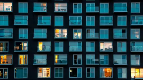 Getty Images A block of flats at night in London